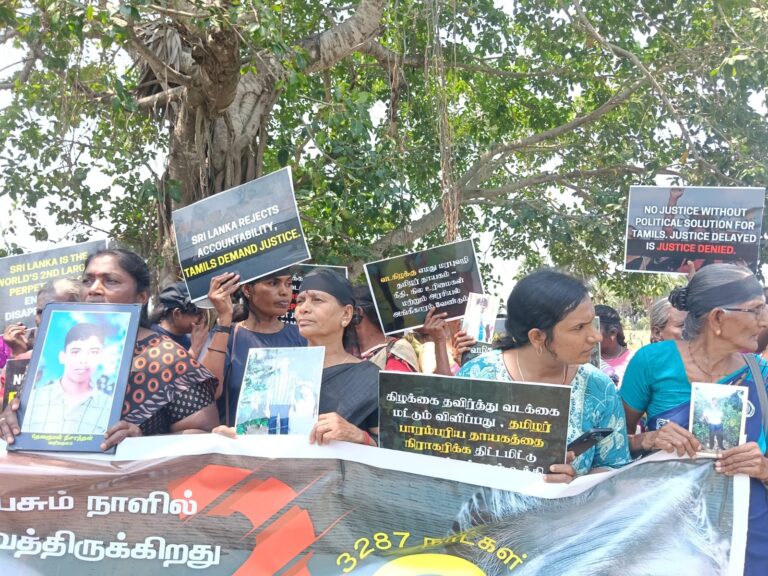 சர்வதேச நீதி கோரி உறவுகளை இராணுவத்திடம் கையளித்த இடத்தில்   மாபெரும்  போராட்டம்